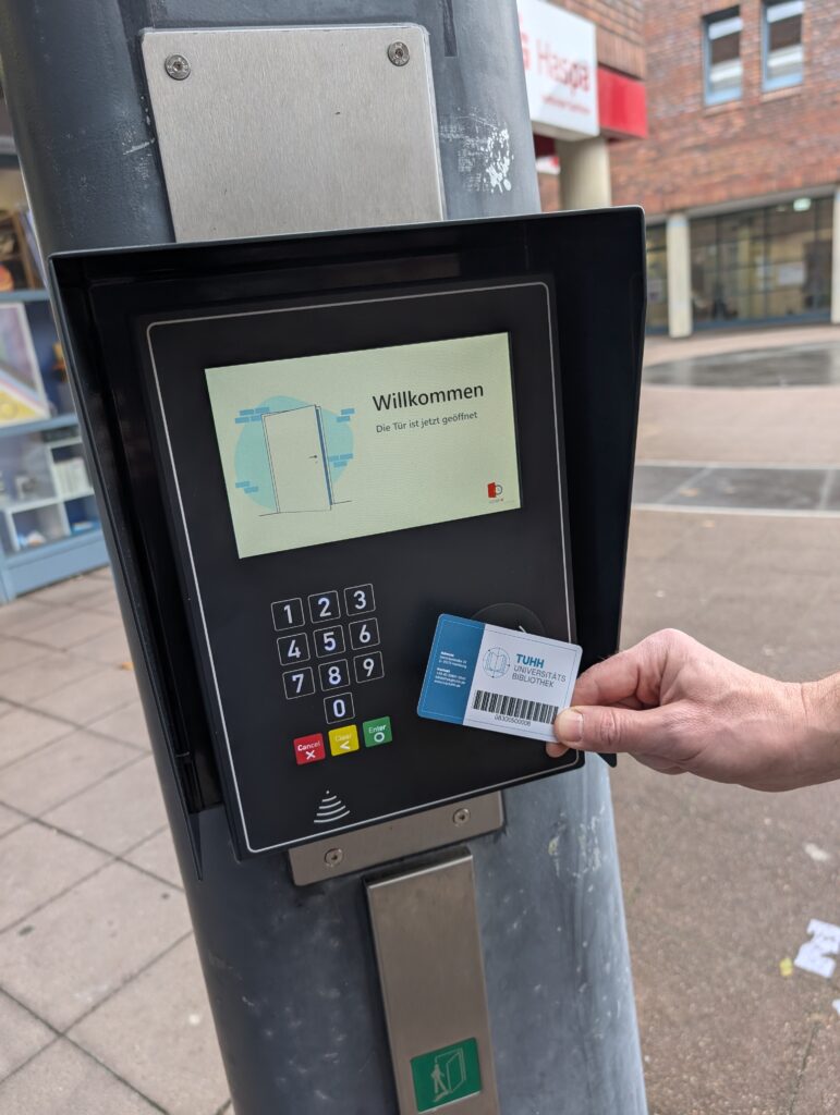 A scanner for opening the library’s entrance door when a library card is held up to it.